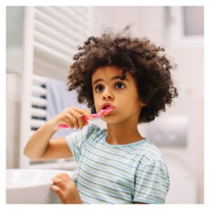 child brushing teeth