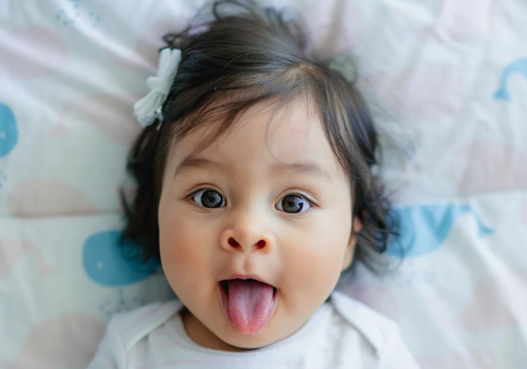 Toddler with tongue out