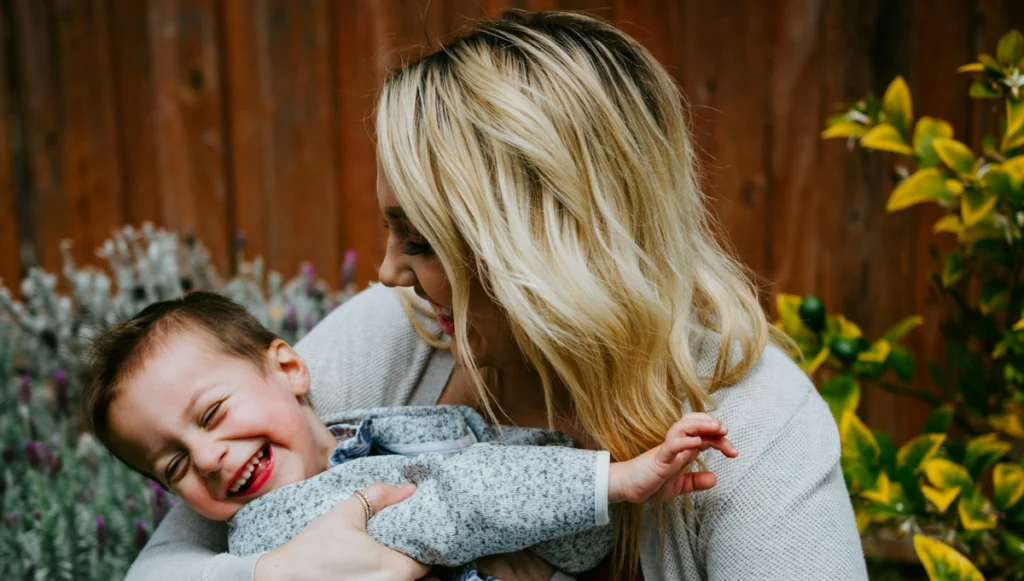 a woman with a toddler